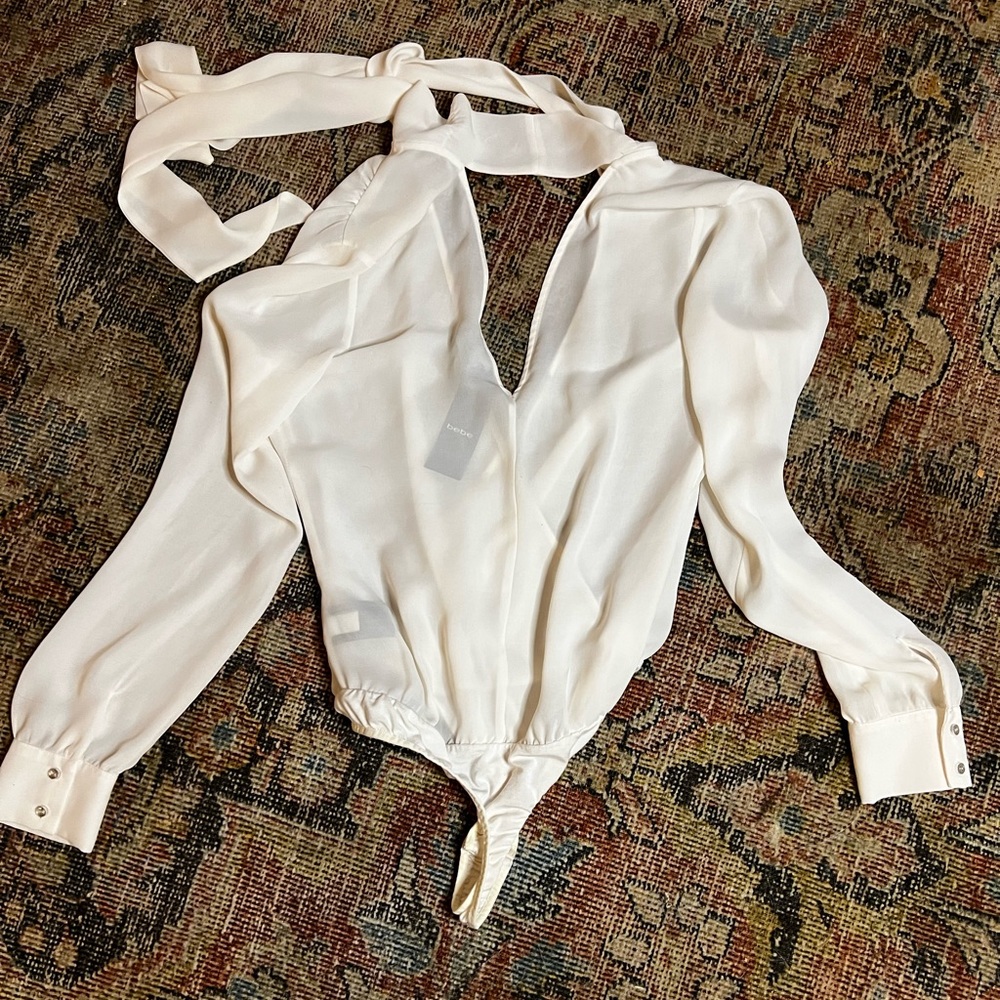 Never worn Bebe bow tie neck bodysuit